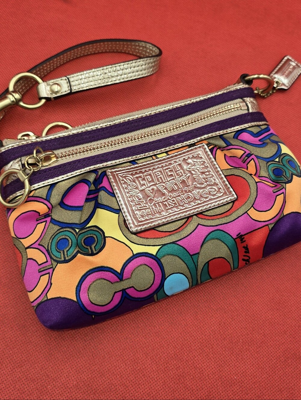 Coach Multicolor Poppy Pattern Wristlet with Metallic Trim